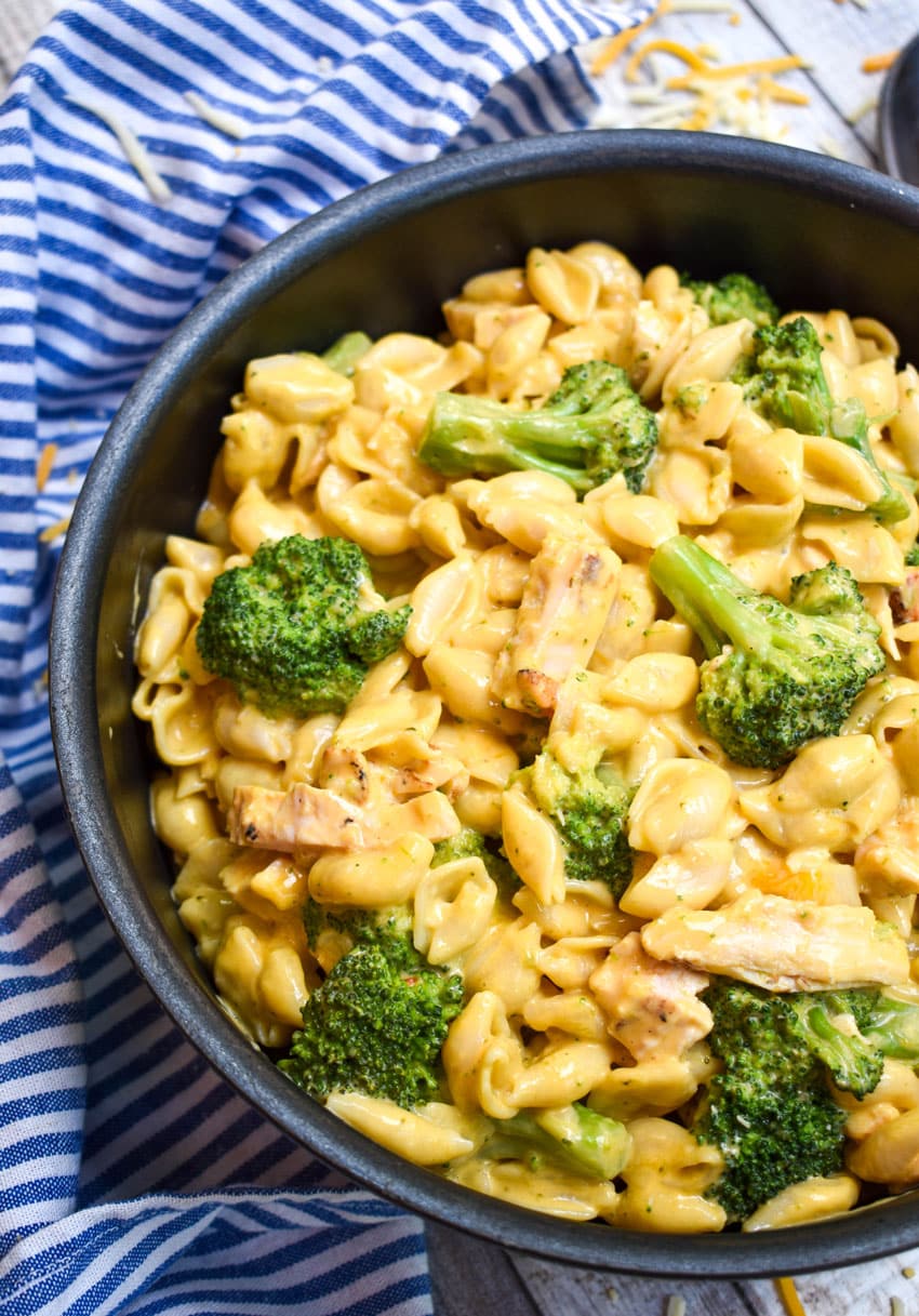 cheesy chicken broccoli macaroni and cheese in a large black pot
