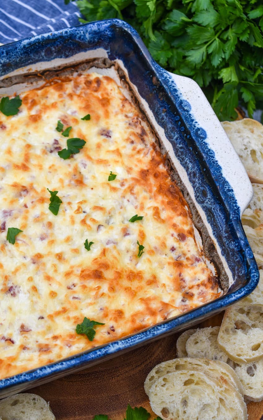 chicken cordon bleu dip in a square baking dish