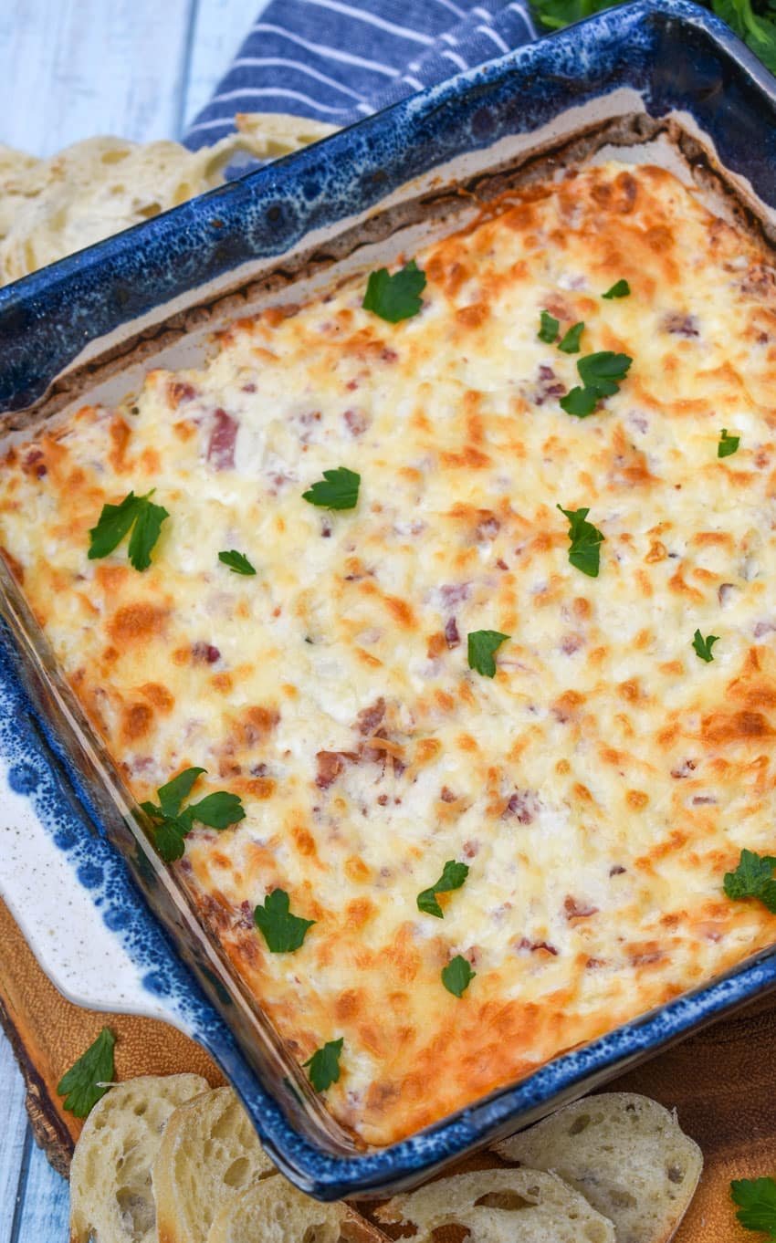chicken cordon bleu dip in a square baking dish