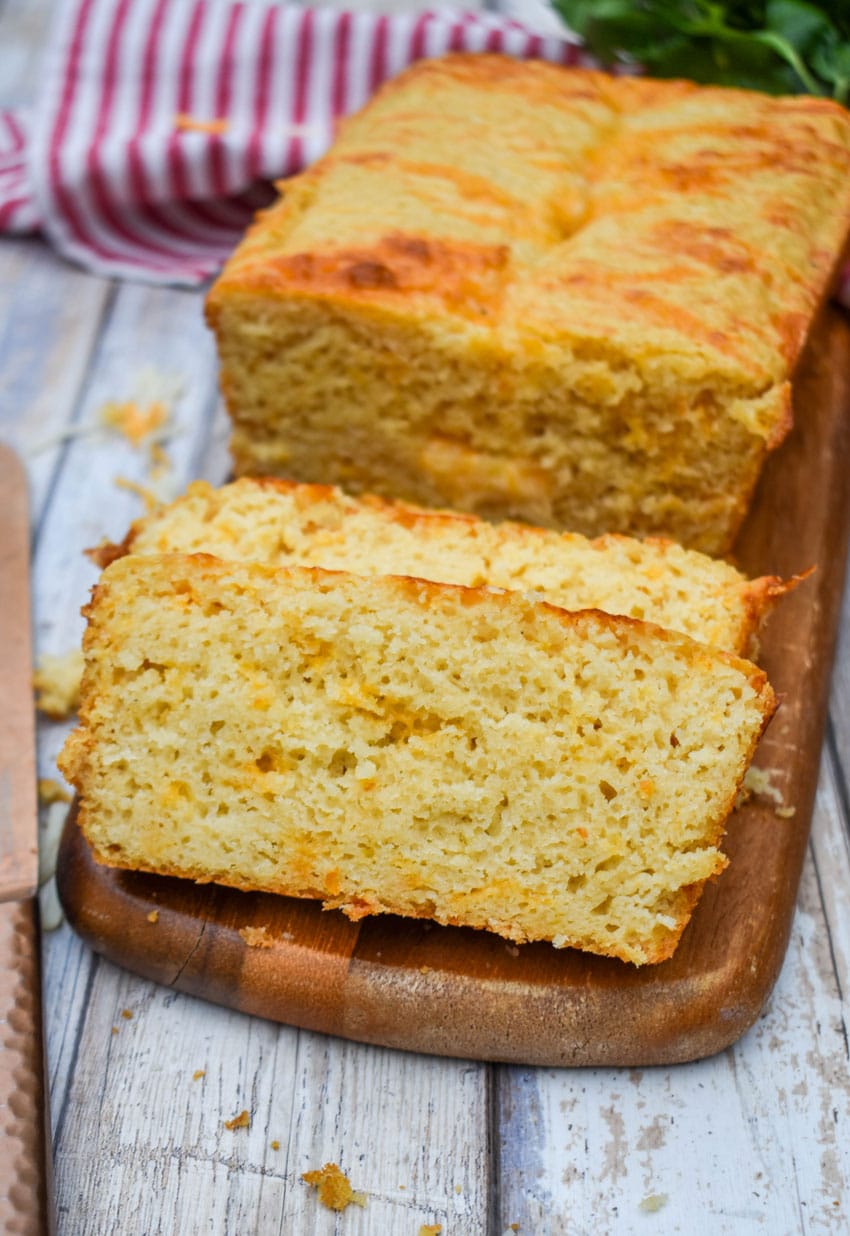 slices of easy cheese bread on a wooden cutting board