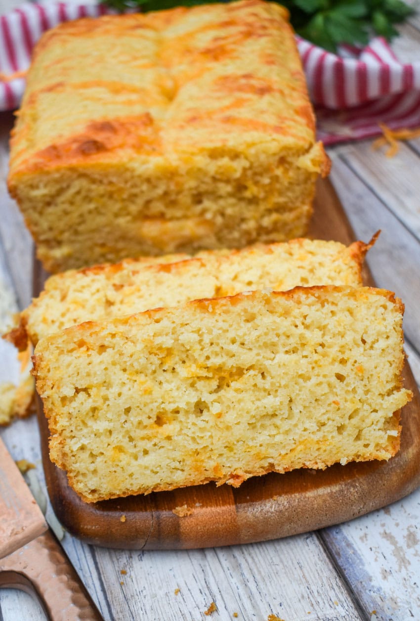 slices of easy cheese bread on a wooden cutting board