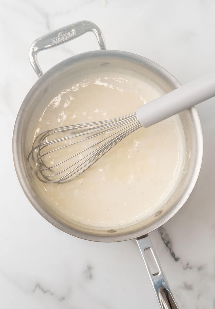 homemade cream sauce in a large metal skillet