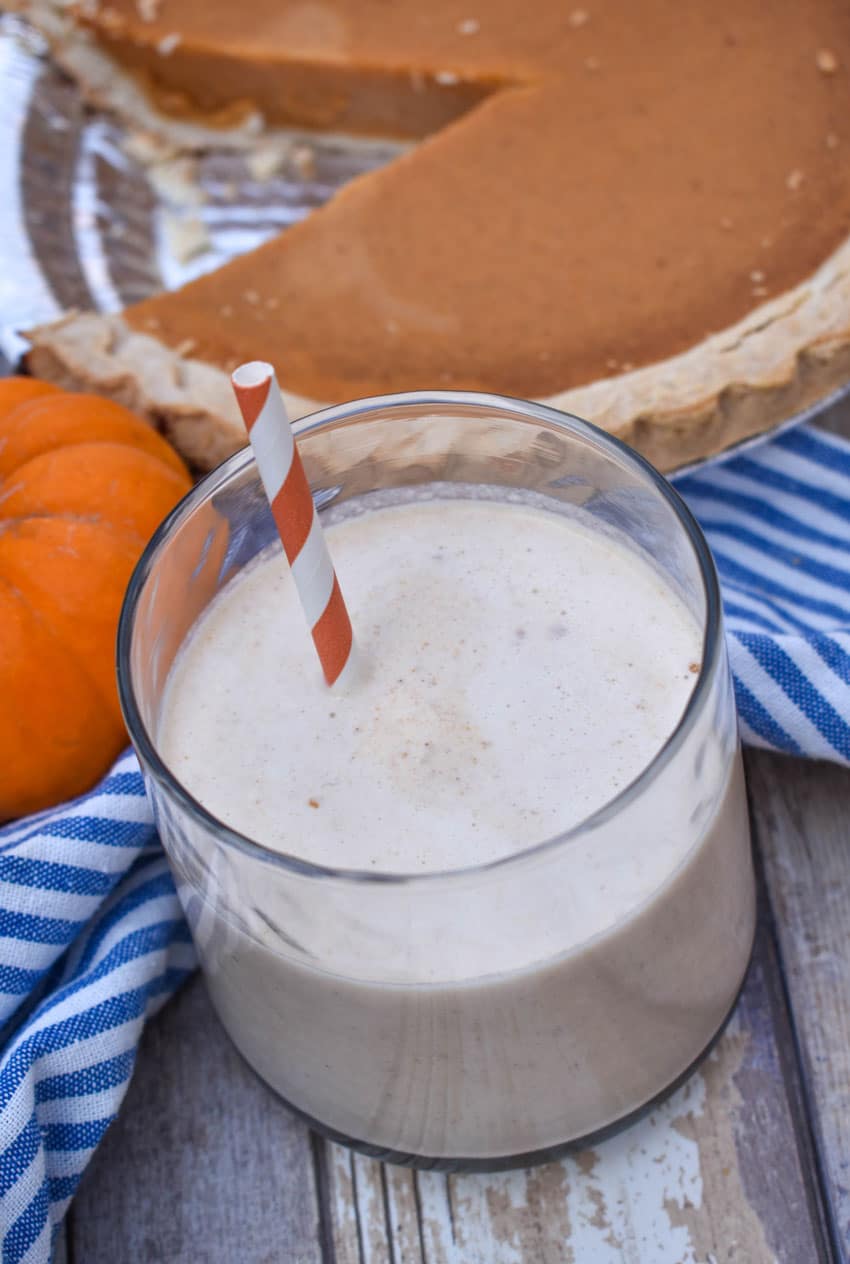 pumpkin pie milkshake in a small glass jar