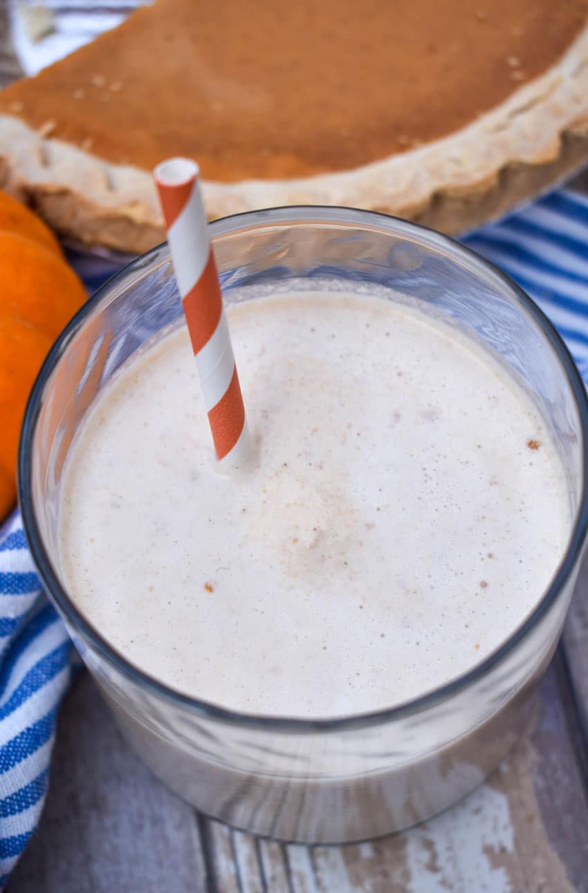 pumpkin pie milkshake in a small glass jar