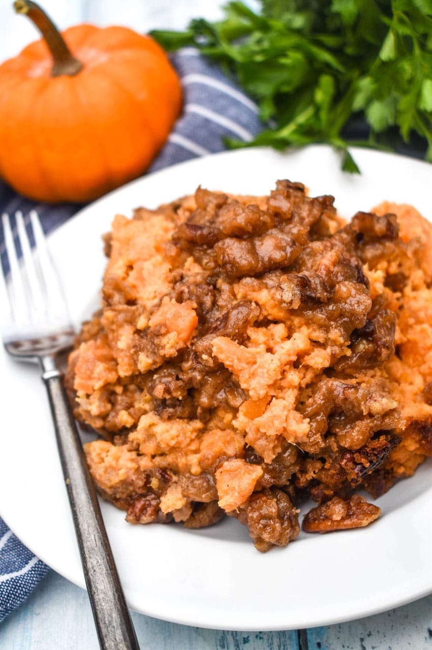 slow cooker sweet potato casserole on a small white plate