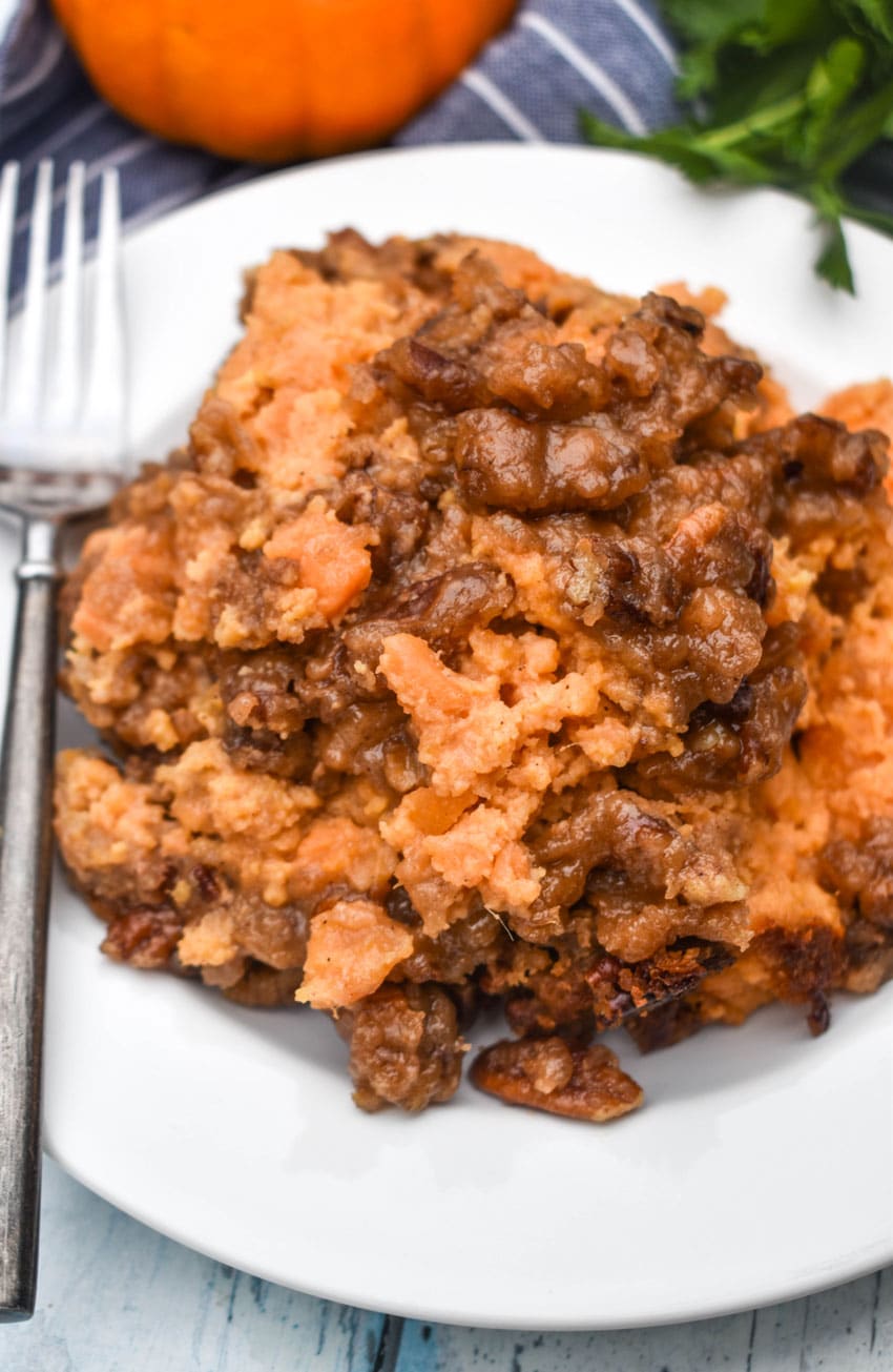 slow cooker sweet potato casserole on a small white plate