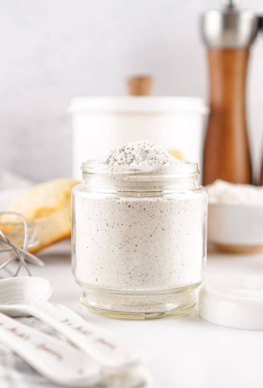 homemade white gravy mix in a small glass jar