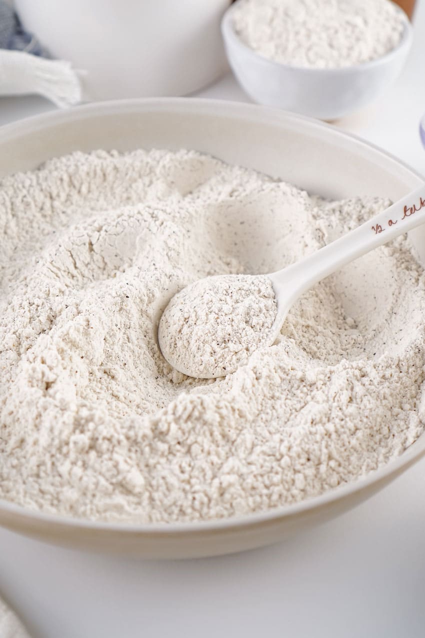 homemade white gravy mix in a large white mixing bowl