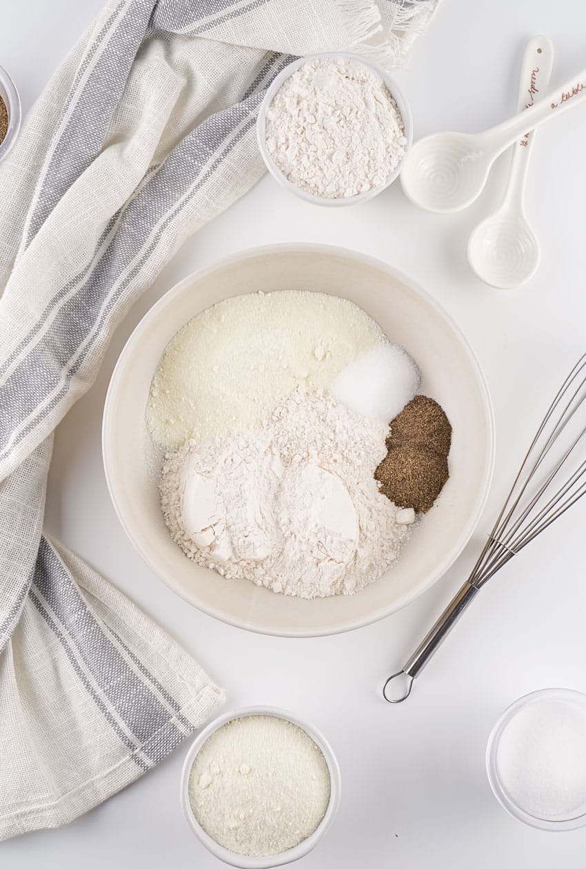 homemade white gravy mix in a large white mixing bowl