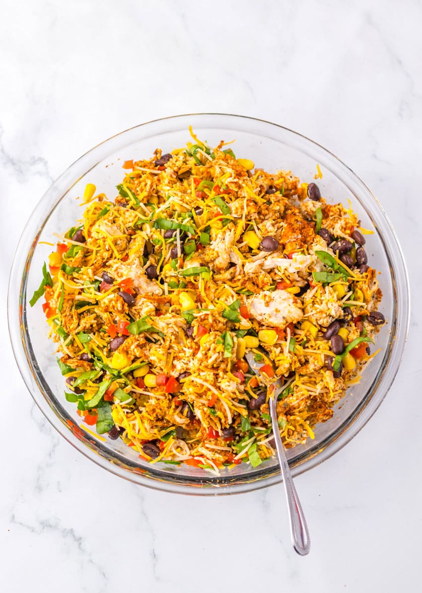 southwestern egg roll filling in a glass mixing bowl