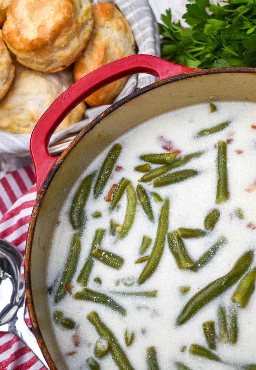 creamy green bean soup in a large red dutch oven