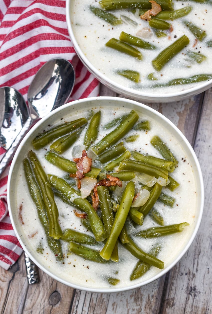 green bean soup in two small white bowls