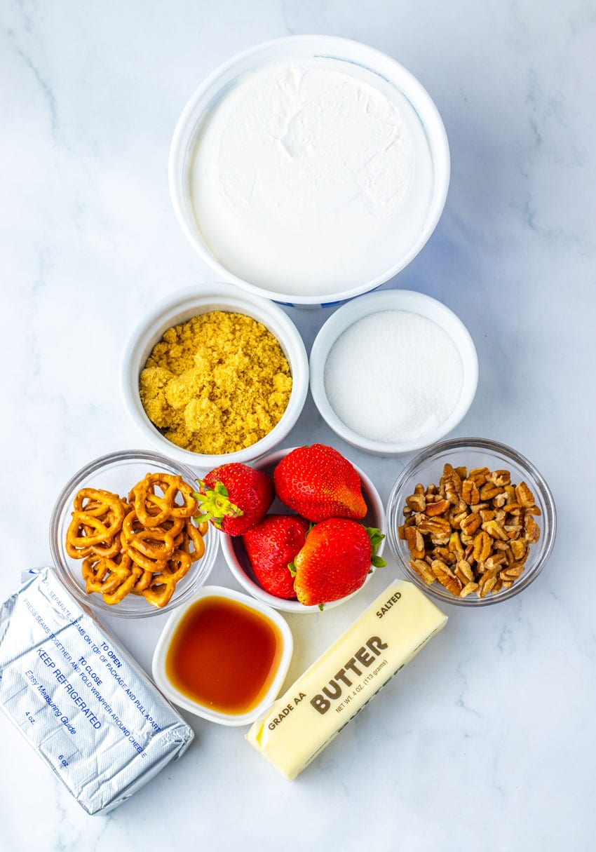 an overhead image showing the measured ingredients needed to make a batch of strawberry pretzel fluff salad