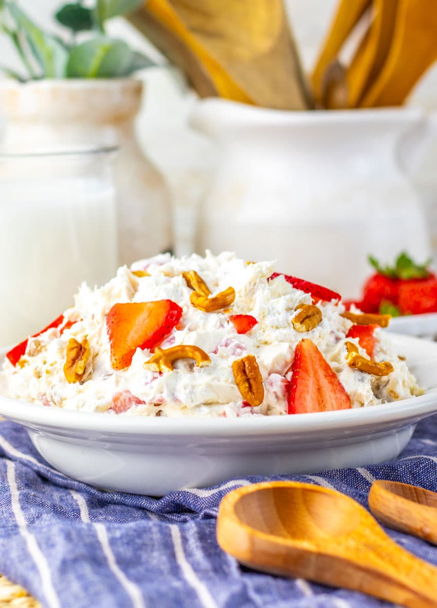 strawberry pretzel fluff salad in a white bowl