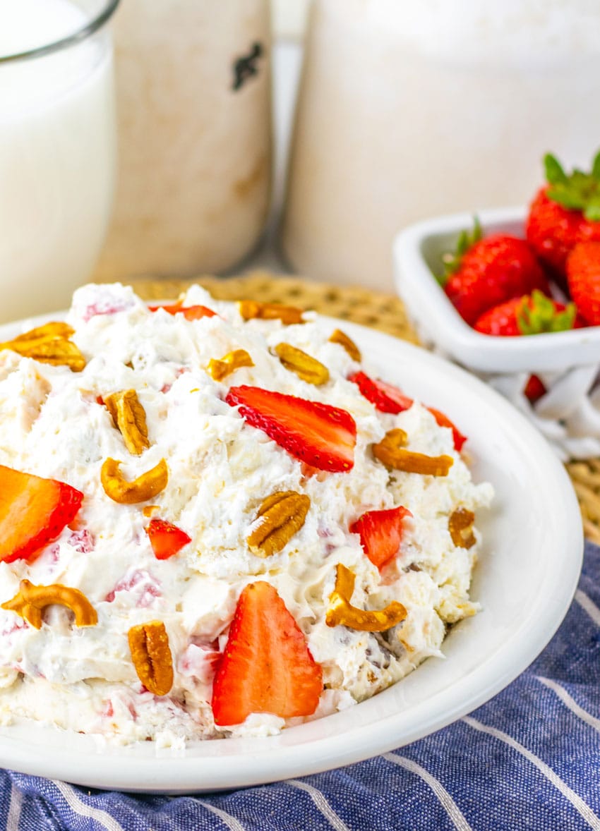 strawberry pretzel fluff salad in a white bowl