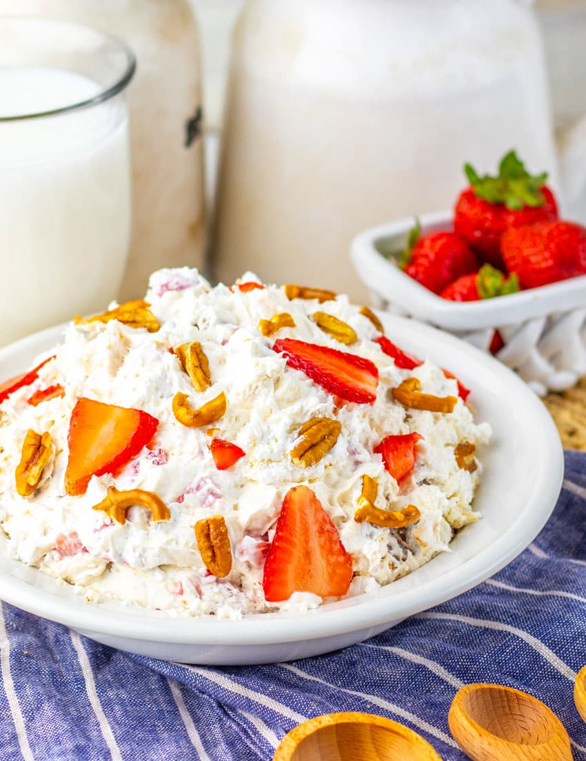 strawberry pretzel fluff salad in a white bowl