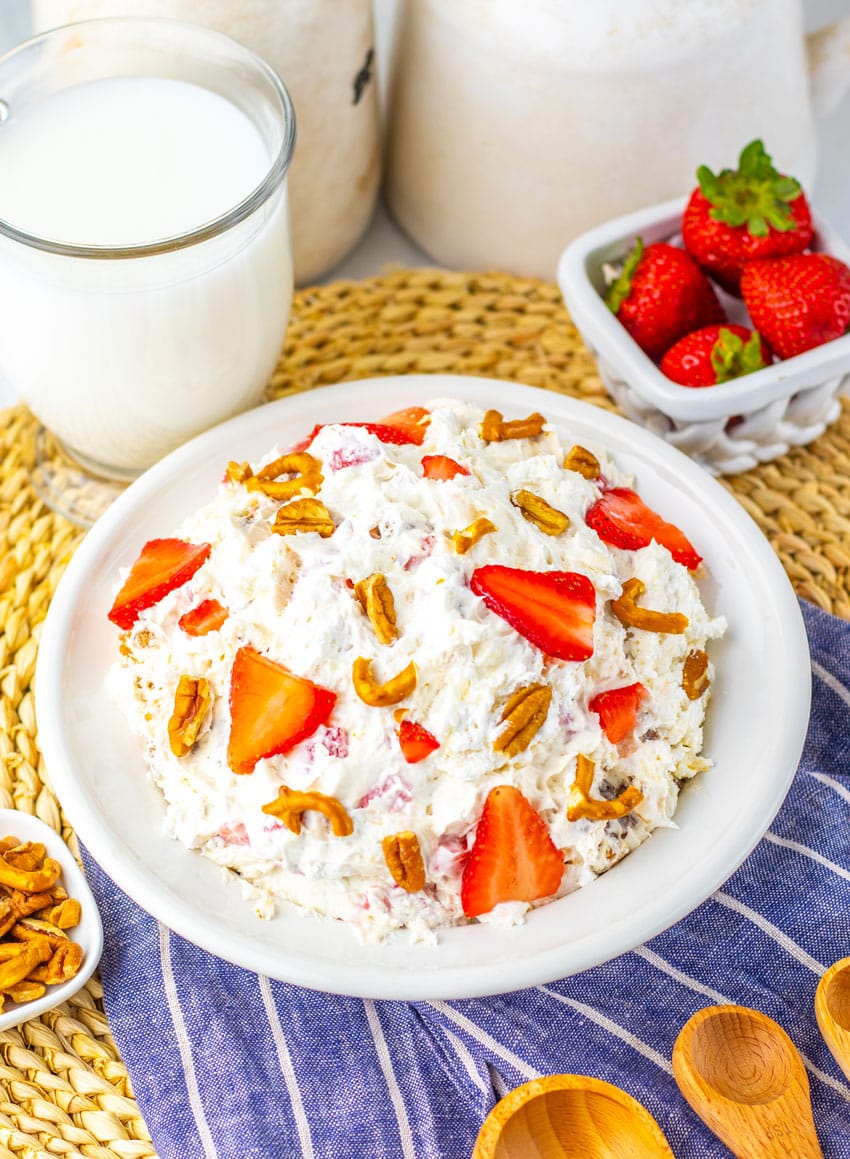 strawberry pretzel fluff salad in a white bowl