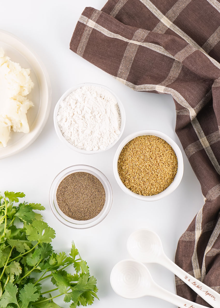 an overhead image showing the measured ingredients needed to make a batch of homemade brown gravy mix