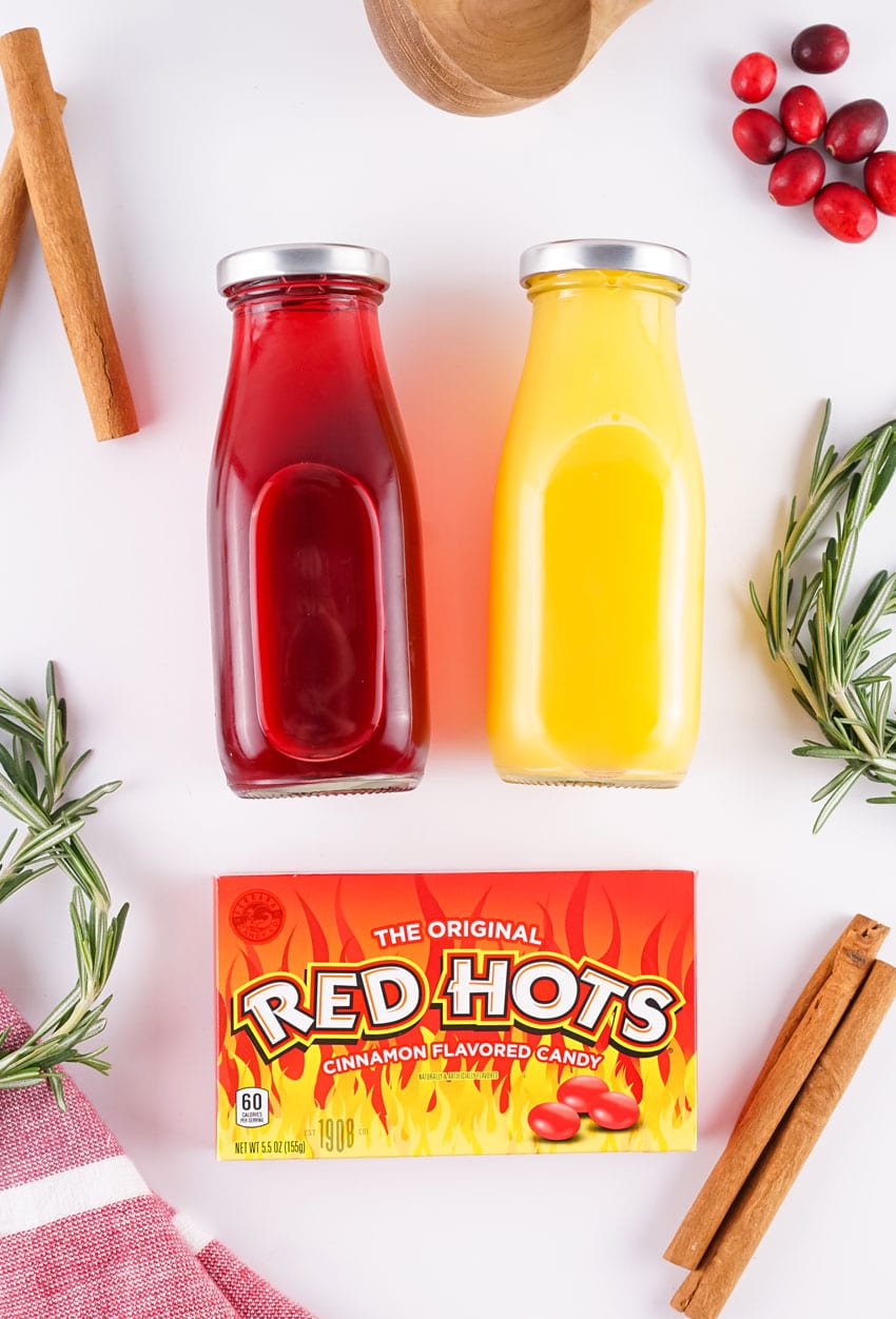 an overhead image showing the measured ingredients needed to make a batch of hot christmas punch
