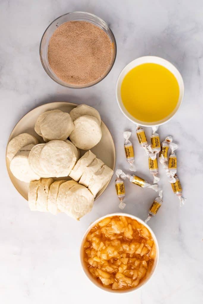 an overhead shot showing all the ingredients needed to make a batch of caramel apple pie bombs