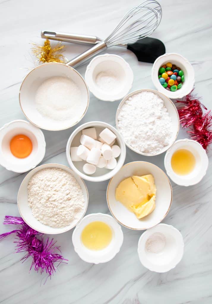 overhead image showing all the ingredients needed to make a batch of melted snowman cookies