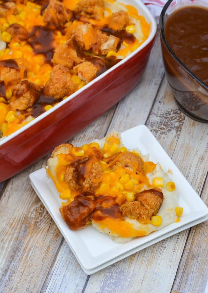 a serving of kfc famous bowl casserole on a small white plate