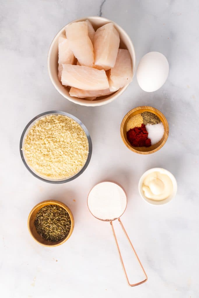 overhead image showing the measured ingredients needed for a batch of air fryer fish sticks