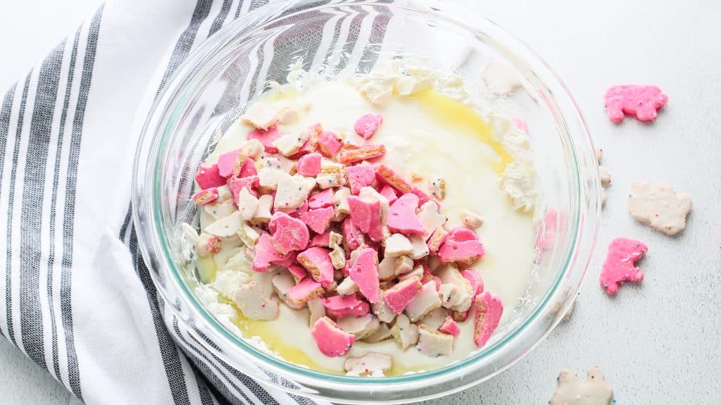ingredients for circus cookie fudge in a large glass mixing bowl