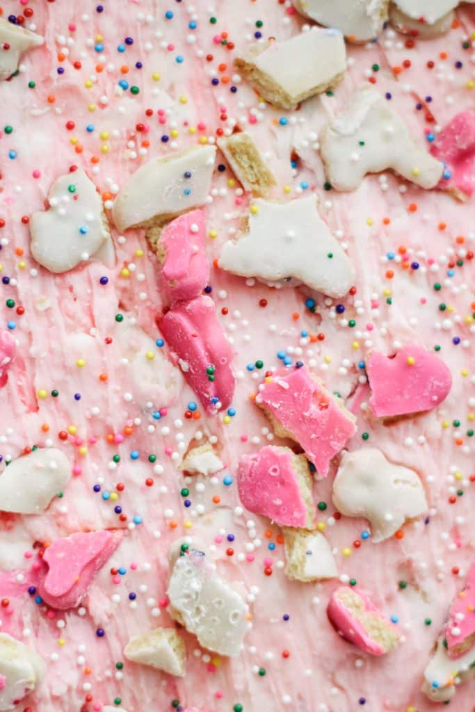 homemade circus cookie fudge topped with colorful sprinkles and pieces of frosted cookies