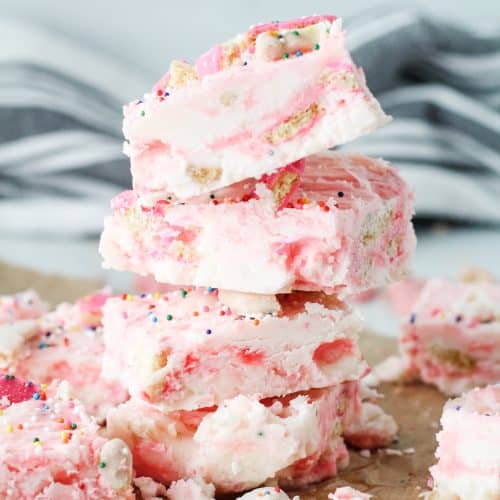 squares of circus cookie fudge stacked on top of each other