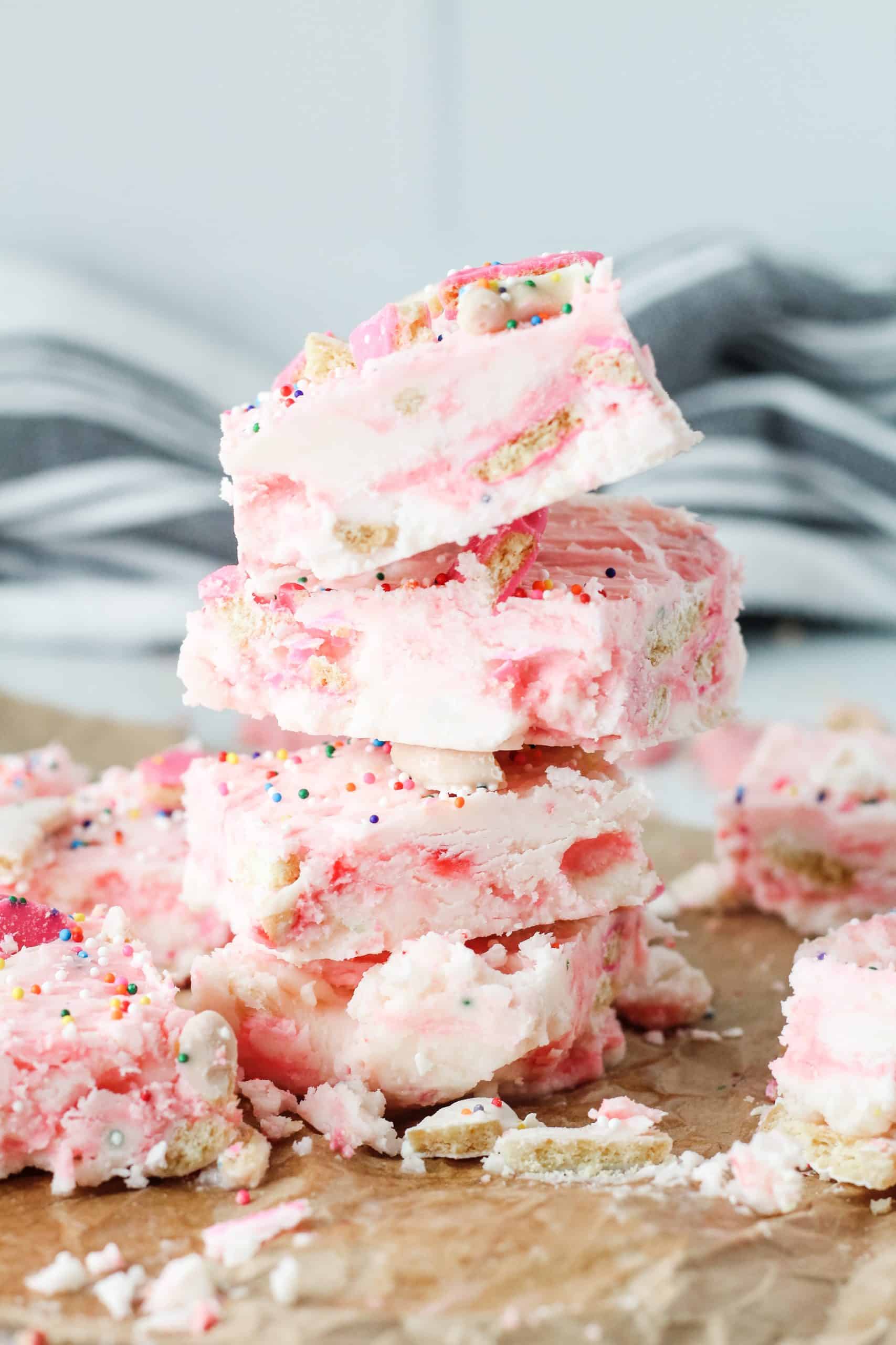 Circus Animal Cookie Fudge squares of circus cookie fudge stacked on top of each other