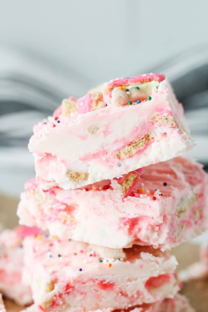squares of circus cookie fudge stacked on top of each other