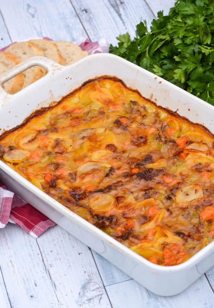 leftover pot roast casserole in a white casserole dish