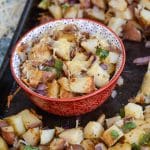 old bay roasted potatoes in a small red bowl