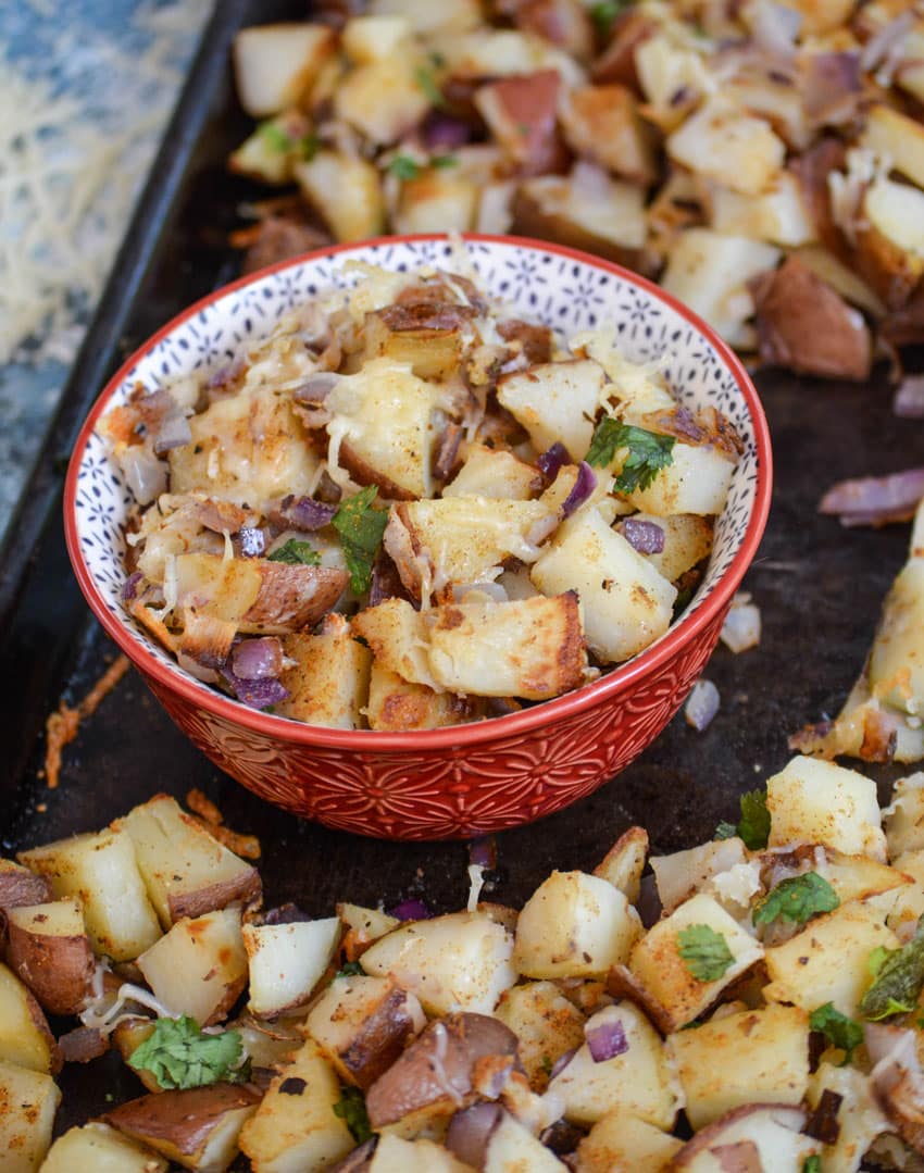 old bay roasted potatoes in a small red bowl