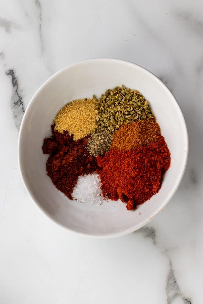 blackened salmon seasoning blend shown in a white bowl