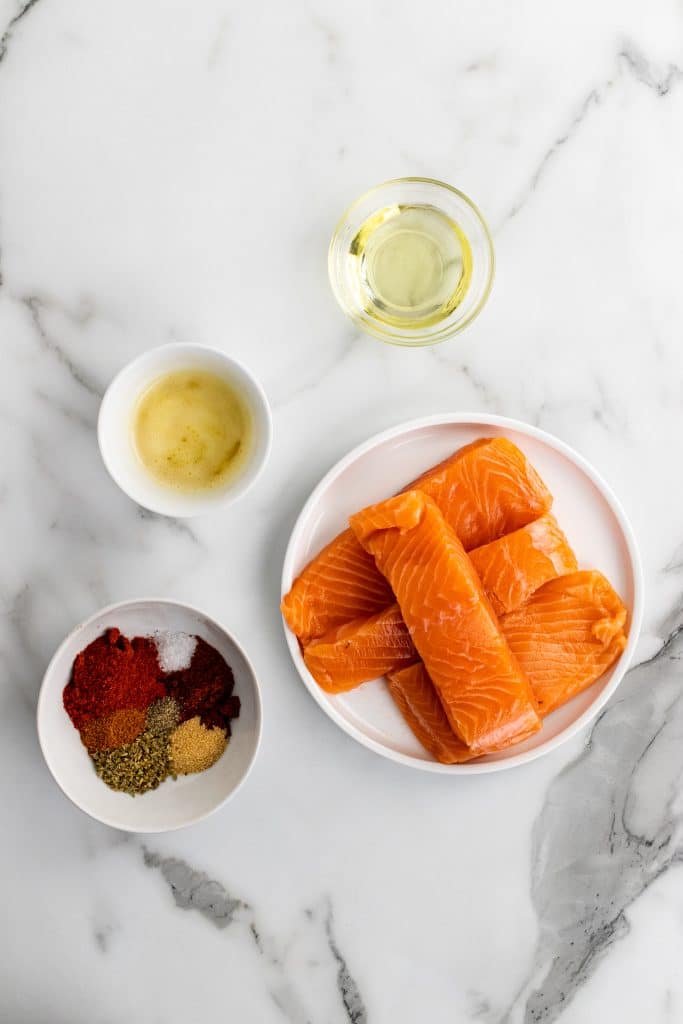 an overhead image showing the measured ingredients needed to make blackened salmon