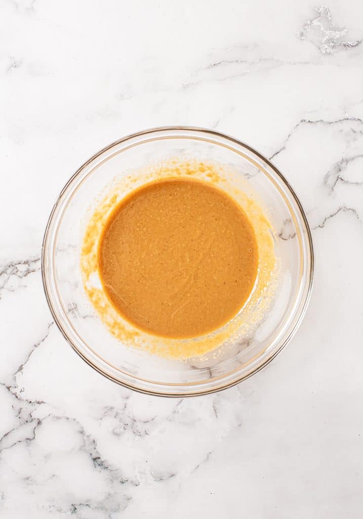 Asian sauce in a glass mixing bowl