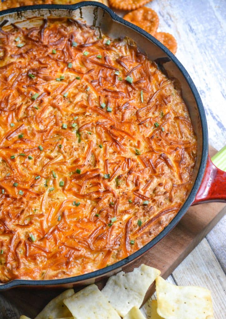 simple smoked crab dip in a red enameled cast iron skillet