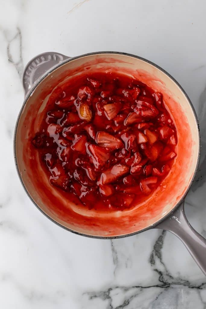 homemade strawberry sauce in a gray skillet