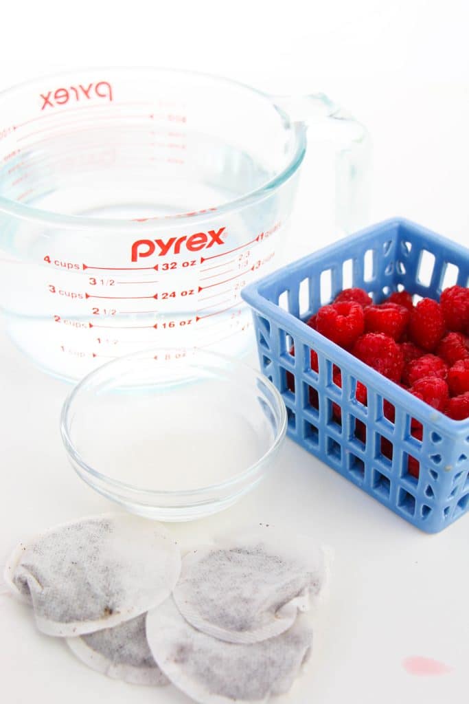 image showing the measured ingredients needed to make homemade raspberry iced tea