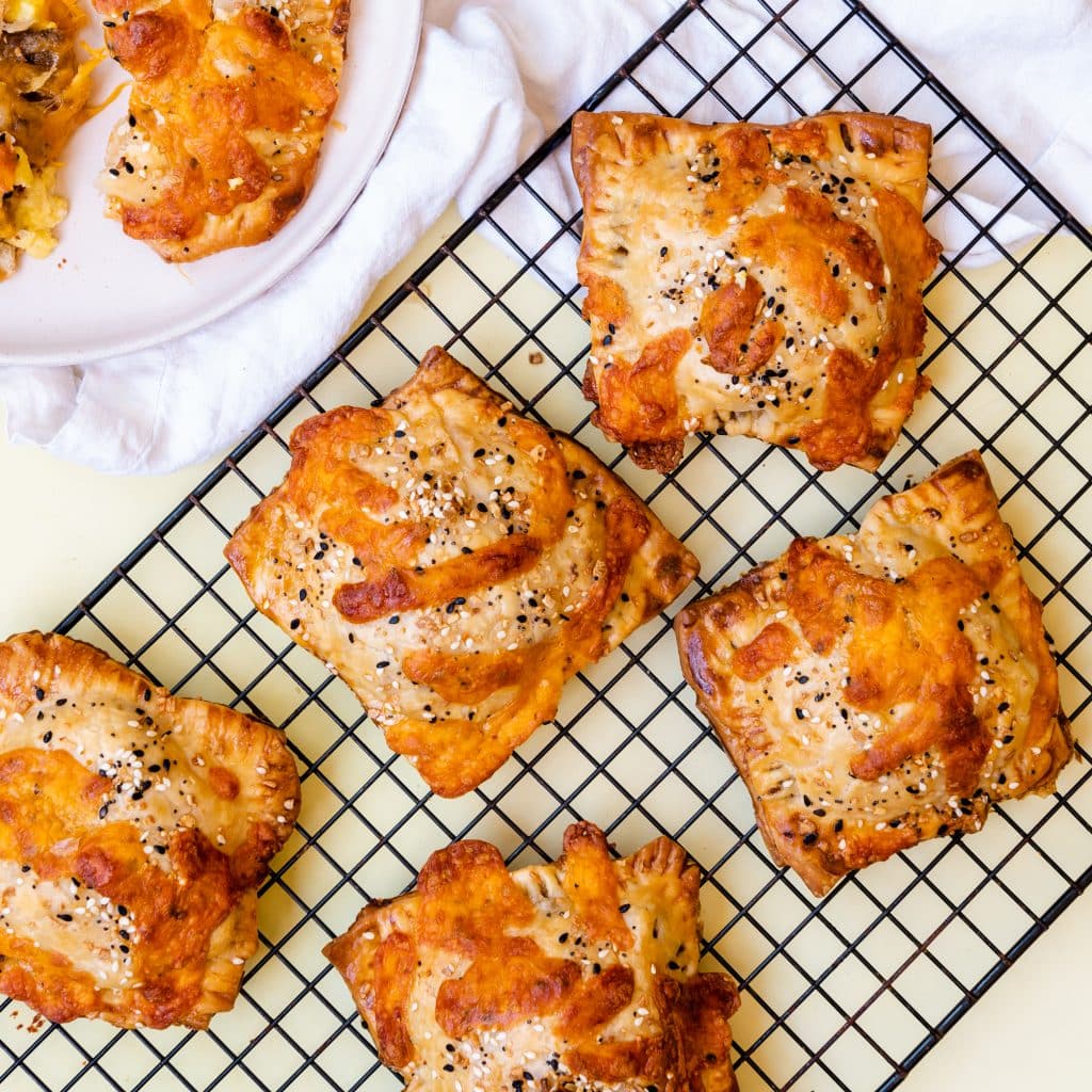 savory breakfast hand pies on a metal wire rack