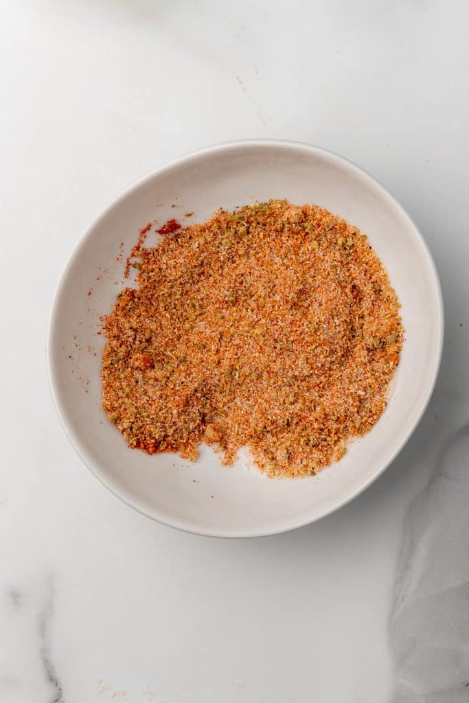 homemade pork rub mix in a small white bowl