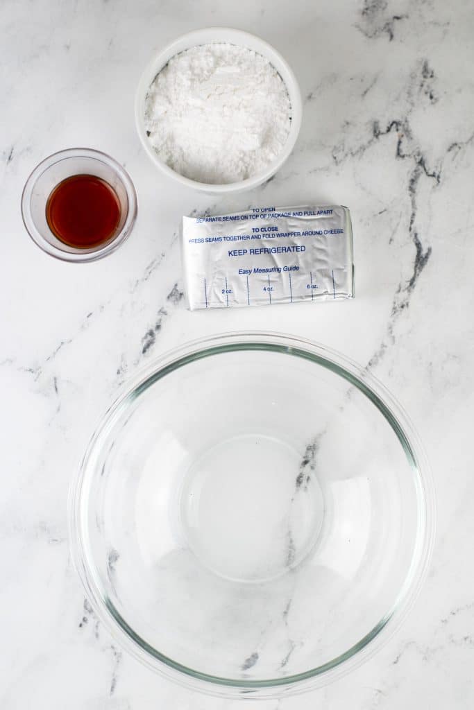 overhead image showing the measured ingredients needed to make cream cheese frosting