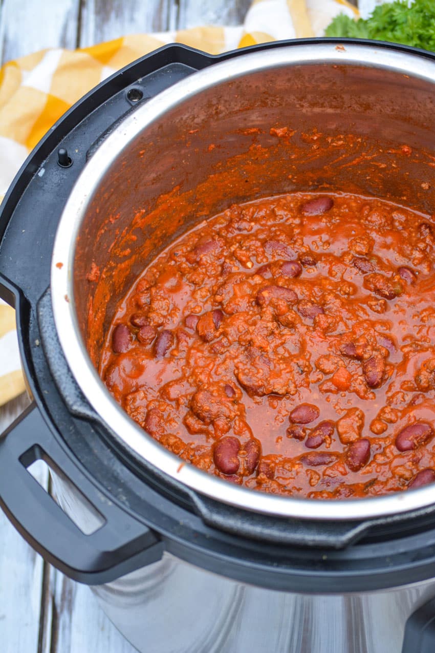 an instant pot filled with beef & bean chili
