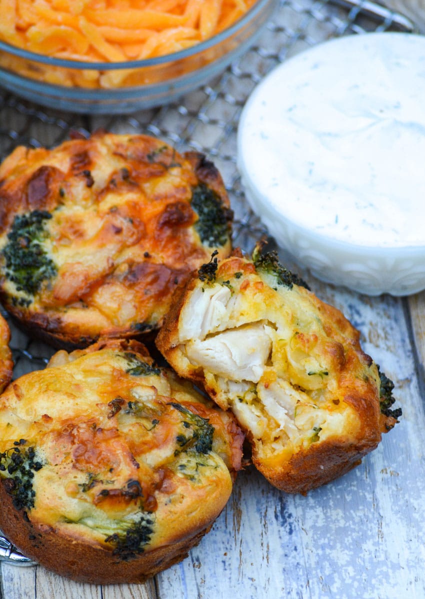 mini chicken broccoli and cheddar pies on a wire cooling rack