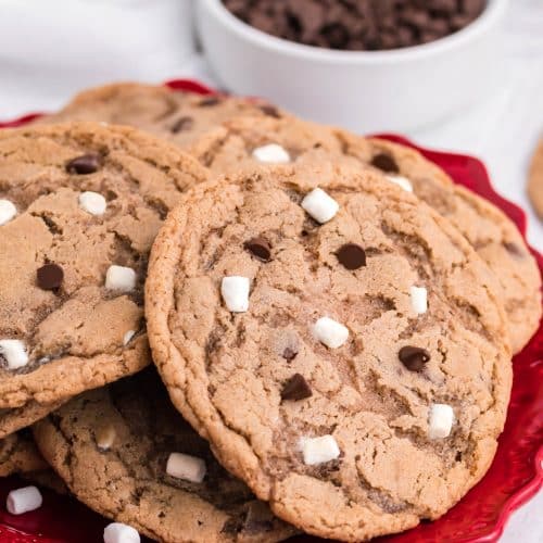 hot chocolate cookies piled on a red plate