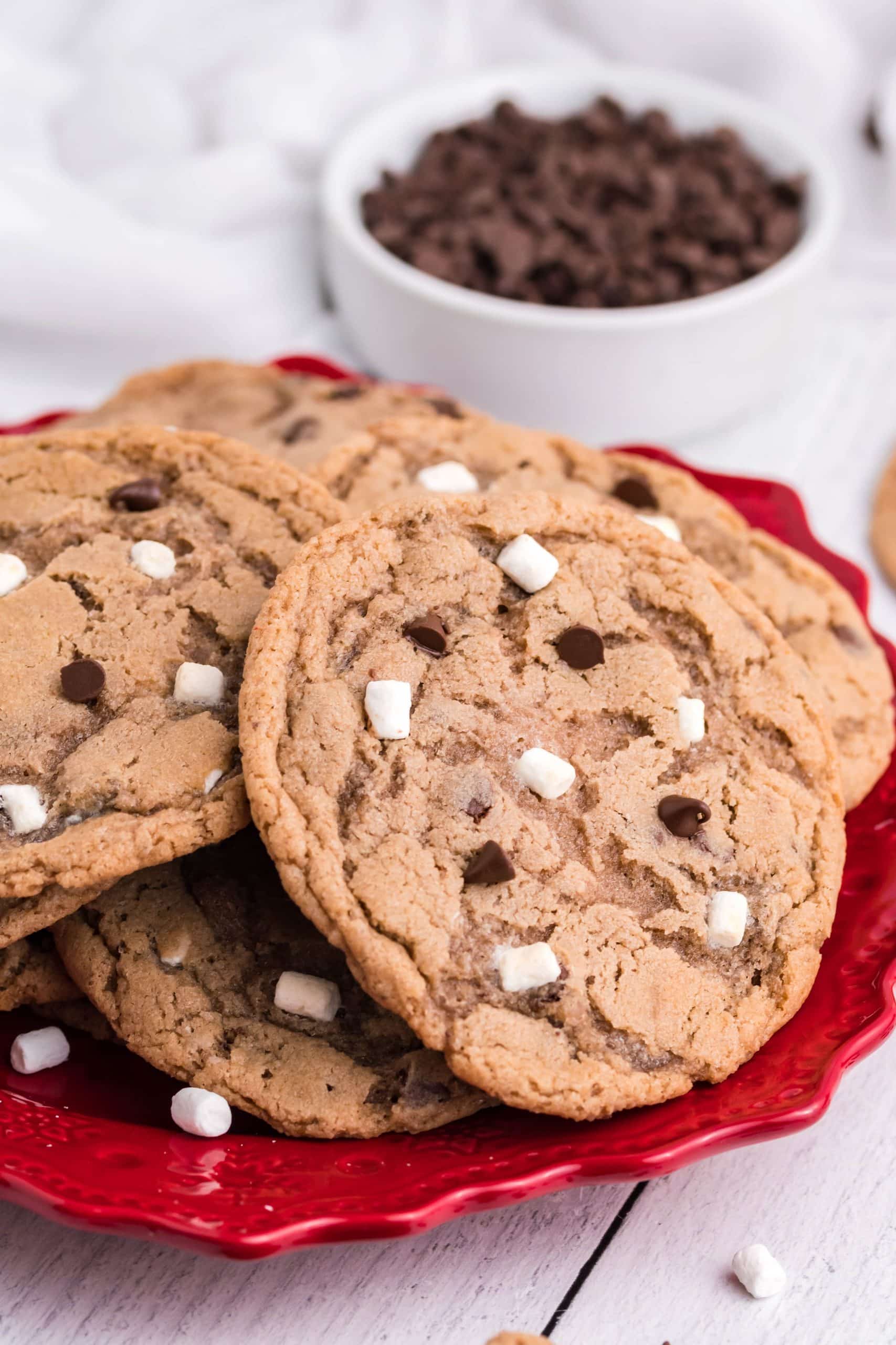 hot chocolate cookies piled on a red plate