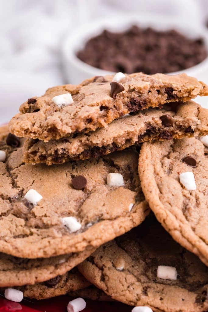 hot chocolate cookies piled on a red plate