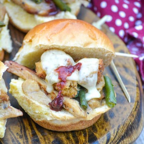 Thanksgiving leftover sliders on a wooden cutting board